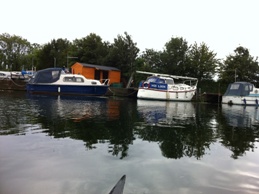 Sailboat tied to the Nene
        Riverbank